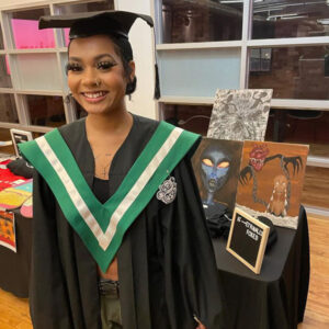 Photo of a female student in graduation cap and gown